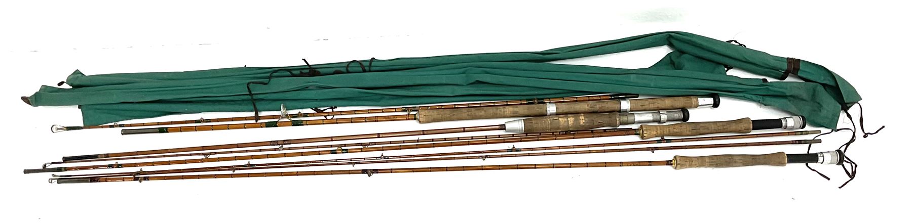 Four split cane fly fishing rods, three made by Burn of Selsdon, the four unmarked, housed in rod bags and a card tube