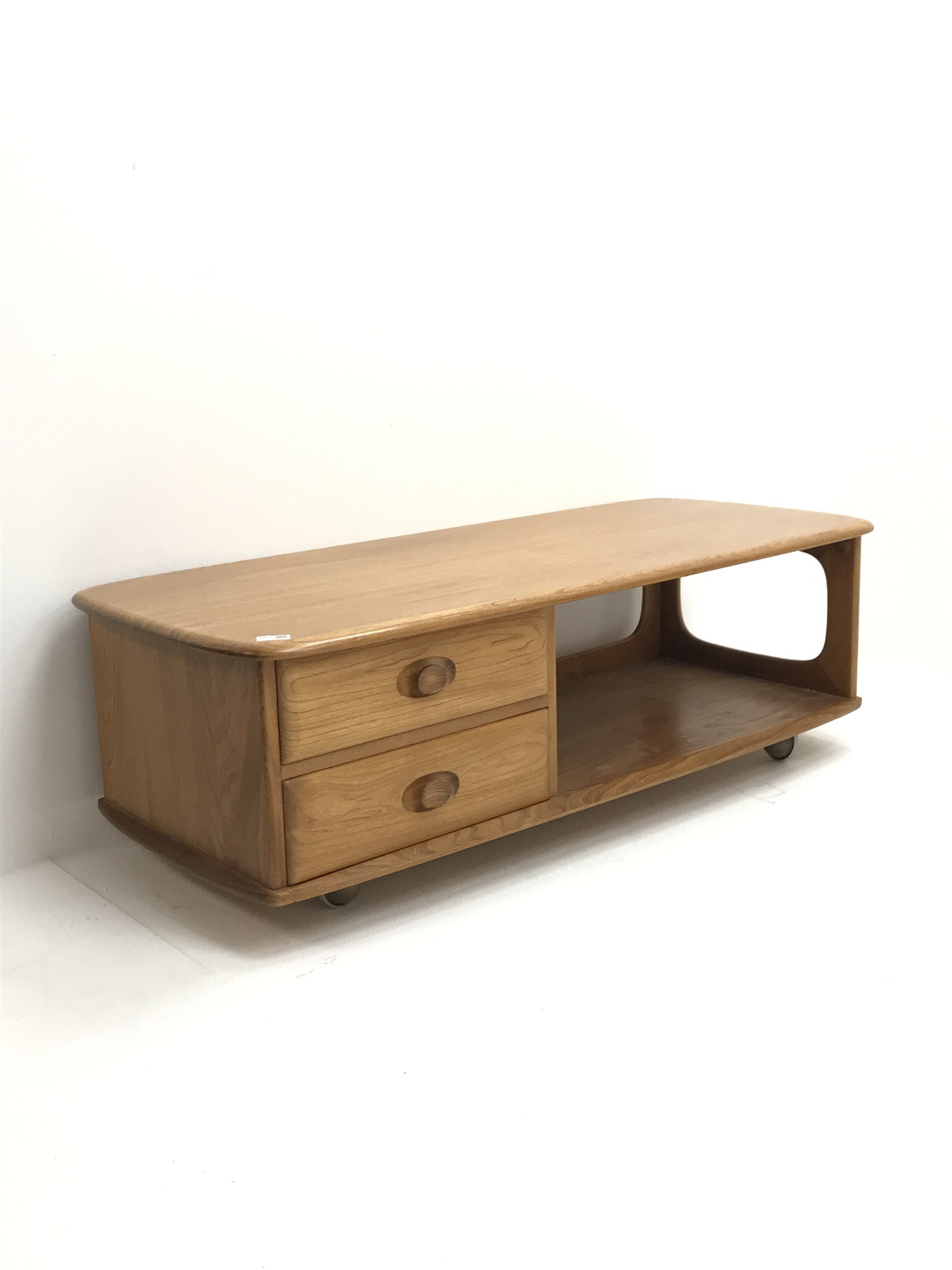 Ercol light elm 'Minerva' long rectangular coffee table fitted with two