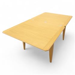 Ercol - light oak ‘Artisan’ rectangular dining table with chamfered top extending fold over top and tapered legs, together with two matching high back dining chairs upholstered in textured beige fabric (Chairs H 98cm, W 47cm, D 52cm)