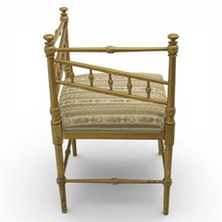 19th century Scandinavian corner chair, with rail back and sides formed with turned spindles and finial terminals, fitted with an upholstered seat in striped floral fabric, raised on turned supports united by stretchers