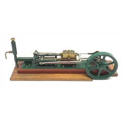 Scale built brass and steel model of a steam powered horizontal beam engine on mahogany base L41cm H15cm