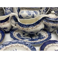 Booths Real Old Willow pattern part tea and dinner service, to include two meat platters, cake stand, teapot, two jugs, sugar bowl, sauce boat, teacups and saucers and a collection of plates and bowls