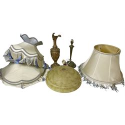 Bronzed ewer heavily embossed with flowers, together with a cast brass lamp base, three fabric tassel lamp shades and a mottled glass ceiling lamp shade 