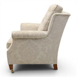 Duresta England - armchair upholstered in beige damask fabric, with deep seat and button back, loose seat cushions with scrolled arms, raised on brass castors