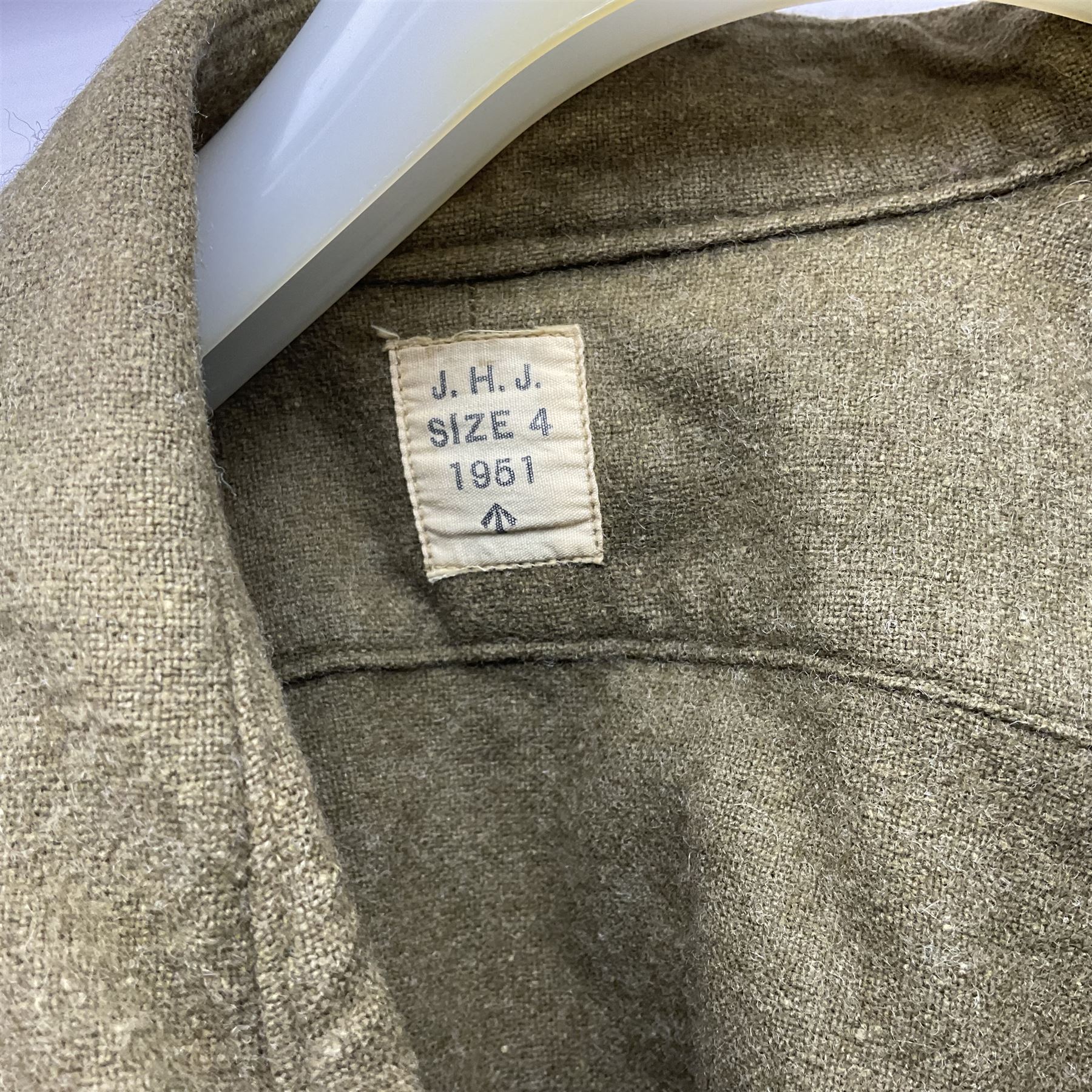 Two post-WWII British Army No.2 Dress tunics, one with Green Howards buttons; army shirt dated 1951; Royal Fleet Auxilliary jacket with trousers; three RAF/WAAF uniforms and RAF Greatcoat; and three canvas/webbing bags, two dated 1943 & 1945