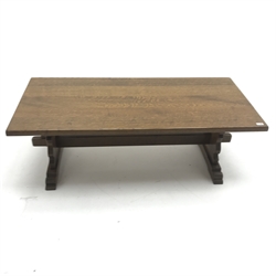 Large refectory style rectangular oak coffee table, shaped solid end supports joined by single stretcher, W151cm, H51cm, D71cm
