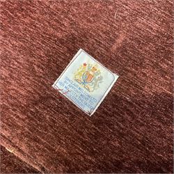 Knole type drop arm sofa with cushions in a traditional patterned upholstery,