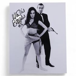 Eight James Bond signed 10 x 8