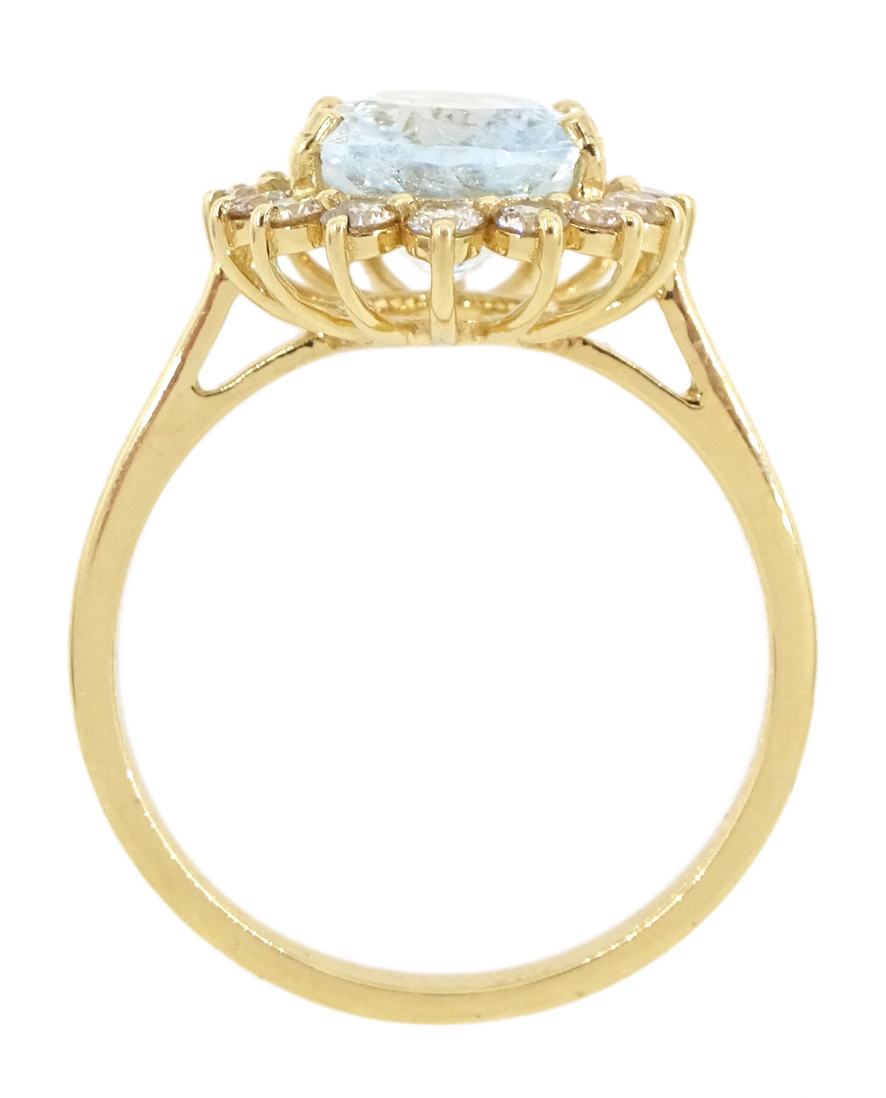 18ct gold oval cut aquamarine and round brilliant cut diamond cluster ring, stamped, aquamarine approx 2.20 carat, total diamond weight approx 0.50 carat