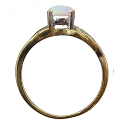 Gold opal and cubic zirconia ring, stamped 9K