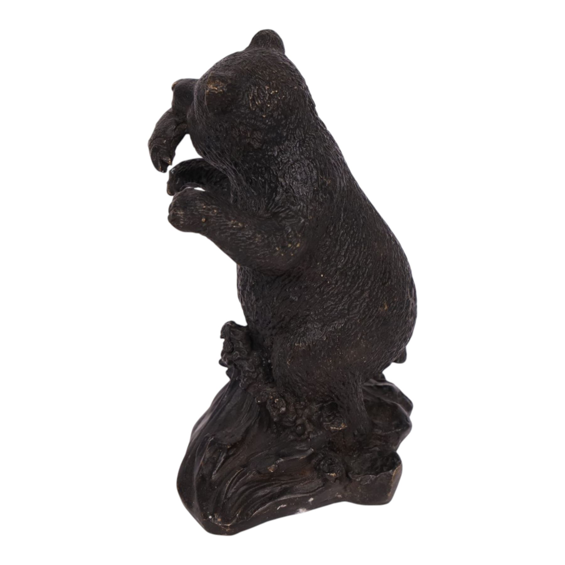 Bronze bear, upon a naturalistic base, with a fish in mouth, H17cm