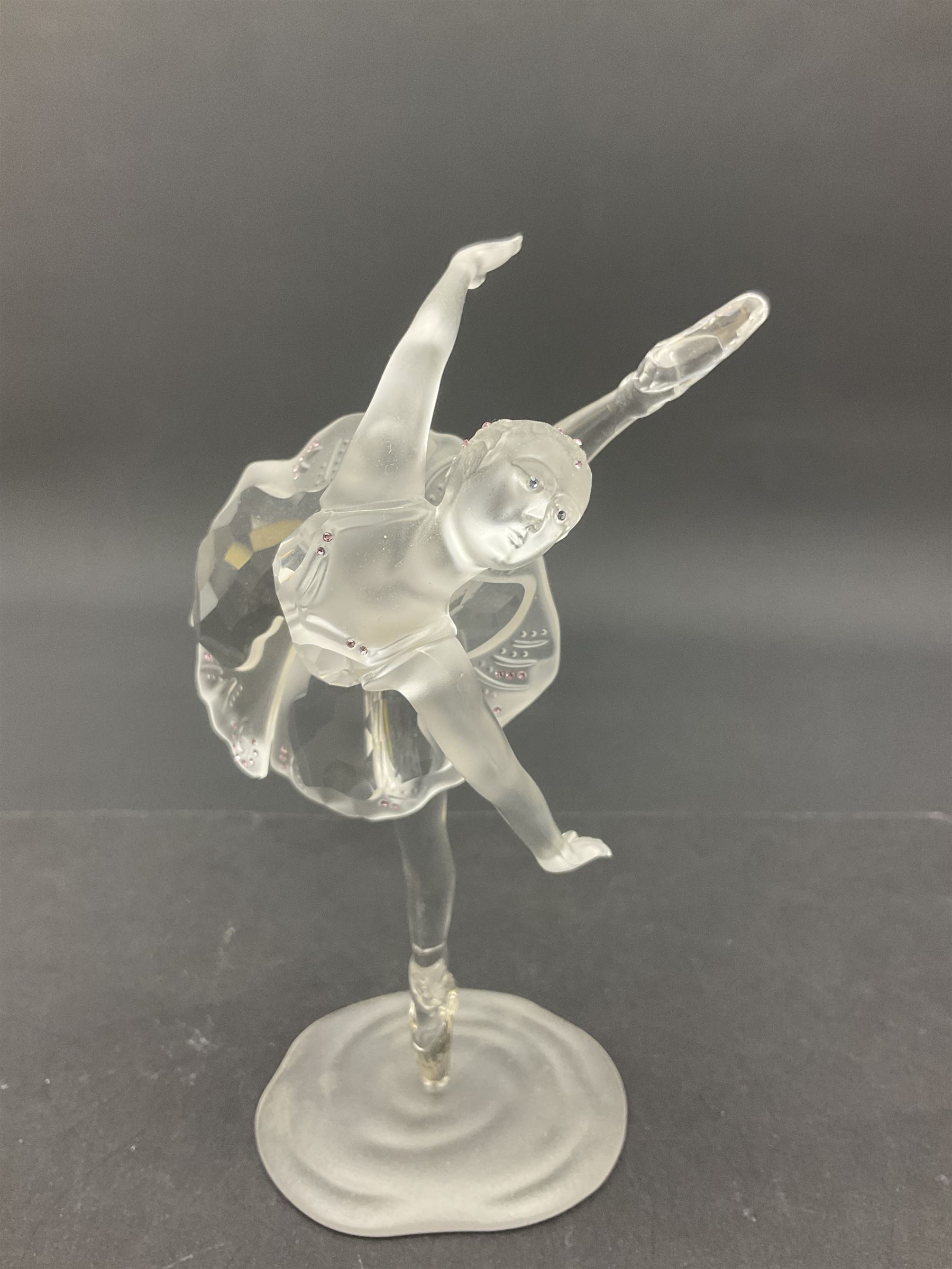 Three Swarovski figures, comprising flamenco dancer, female dancer with certificate and ballerina, tallest H21cm  