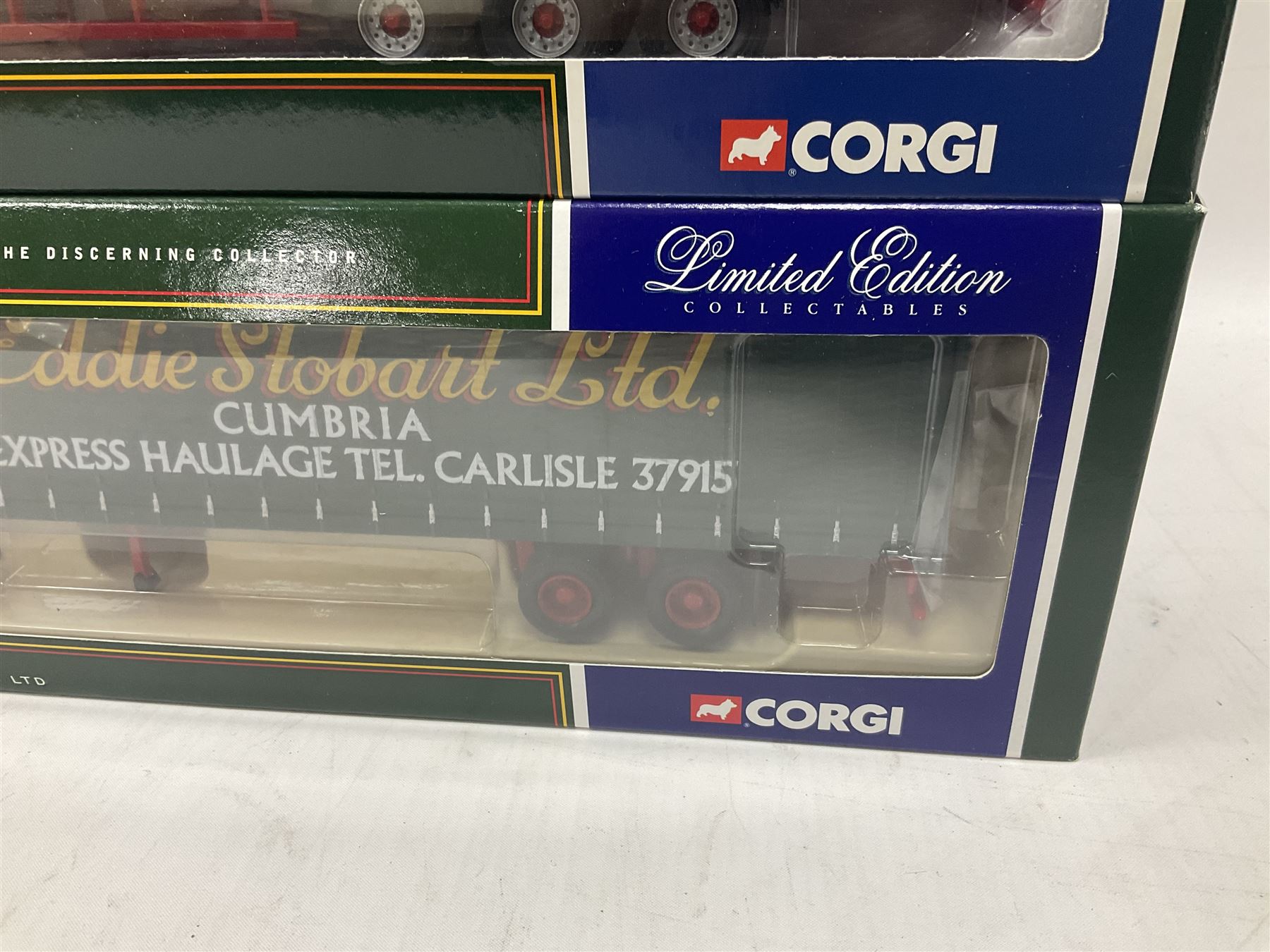 Corgi - four limited edition 1:50 scale Eddie Stobart heavy haulage vehicles comprising CC12802 Scania T-Cab Bulk Tipper; CC13207 DAF XF Space Cab and Flatbed Trailer; CC13101 Volvo F88 Box Trailer; and CC12607 Scammell Crusader Tautliner; all boxed (4)