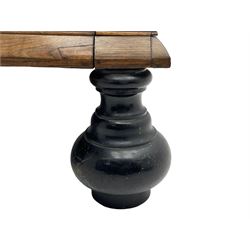 Late 17th century Flemish/Dutch rosewood and oak ‘Zeeuwse Kast’ or cupboard, projecting cornice carved with three putti masks, the uprights carved with lion masks over ribbons, flower heads and foliage, enclosed by four geometric panelled doors, lower central upright carved with flower head over foliate ribbon with bird among foliage, the escutcheon hidden by swivel berry carved cover, interior fitted with shelves, two drawers and shallow hinged cupboard, on two large turned and ebonised feet, circa 1680