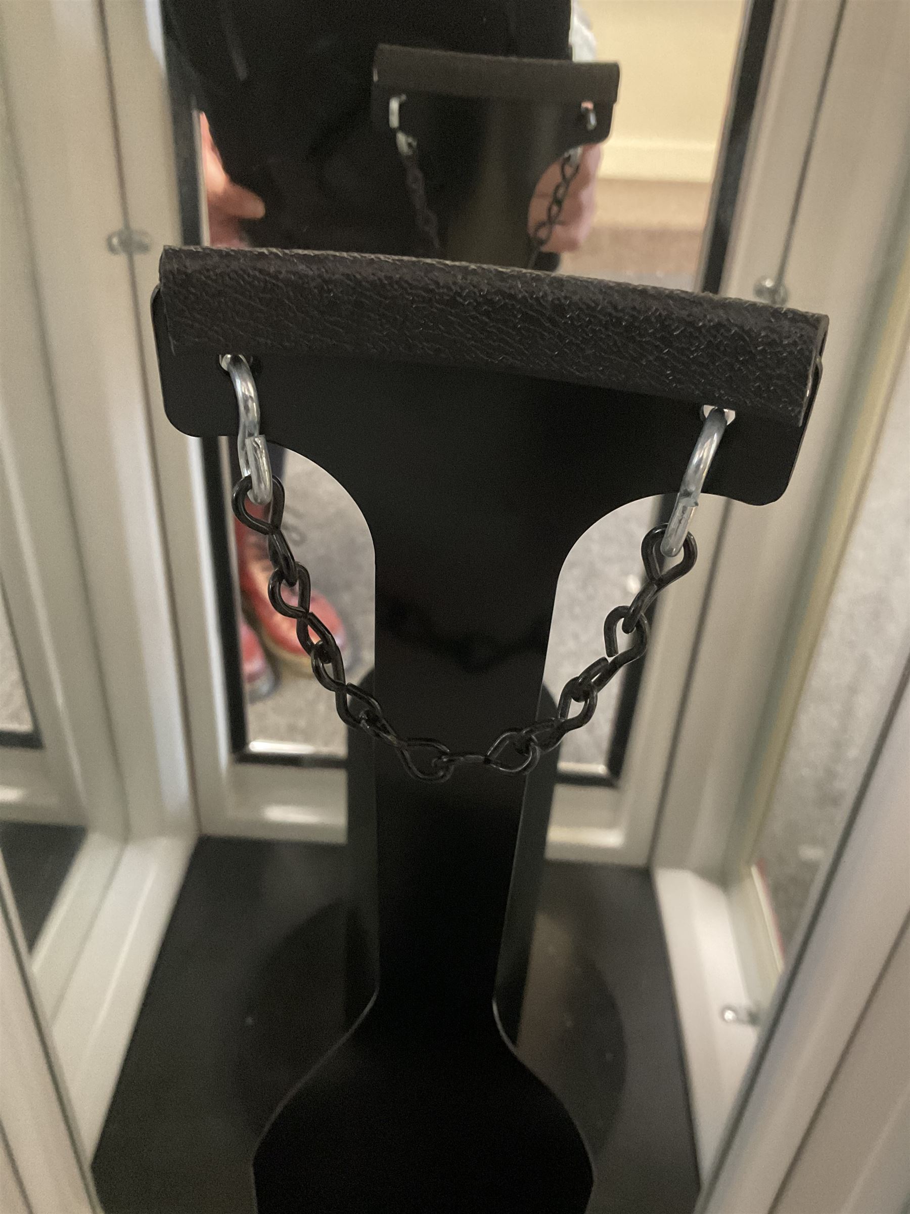 Roadside Relics Fender Custom Shop guitar display case, modelled as an American petrol pump, with a circular two-tone Fender logo light upon the pillar box red cabinet, three sides with glazed panels and chrome detailing, one etched with Fender logo, the interior with removable guitar stand, height including light 184cm