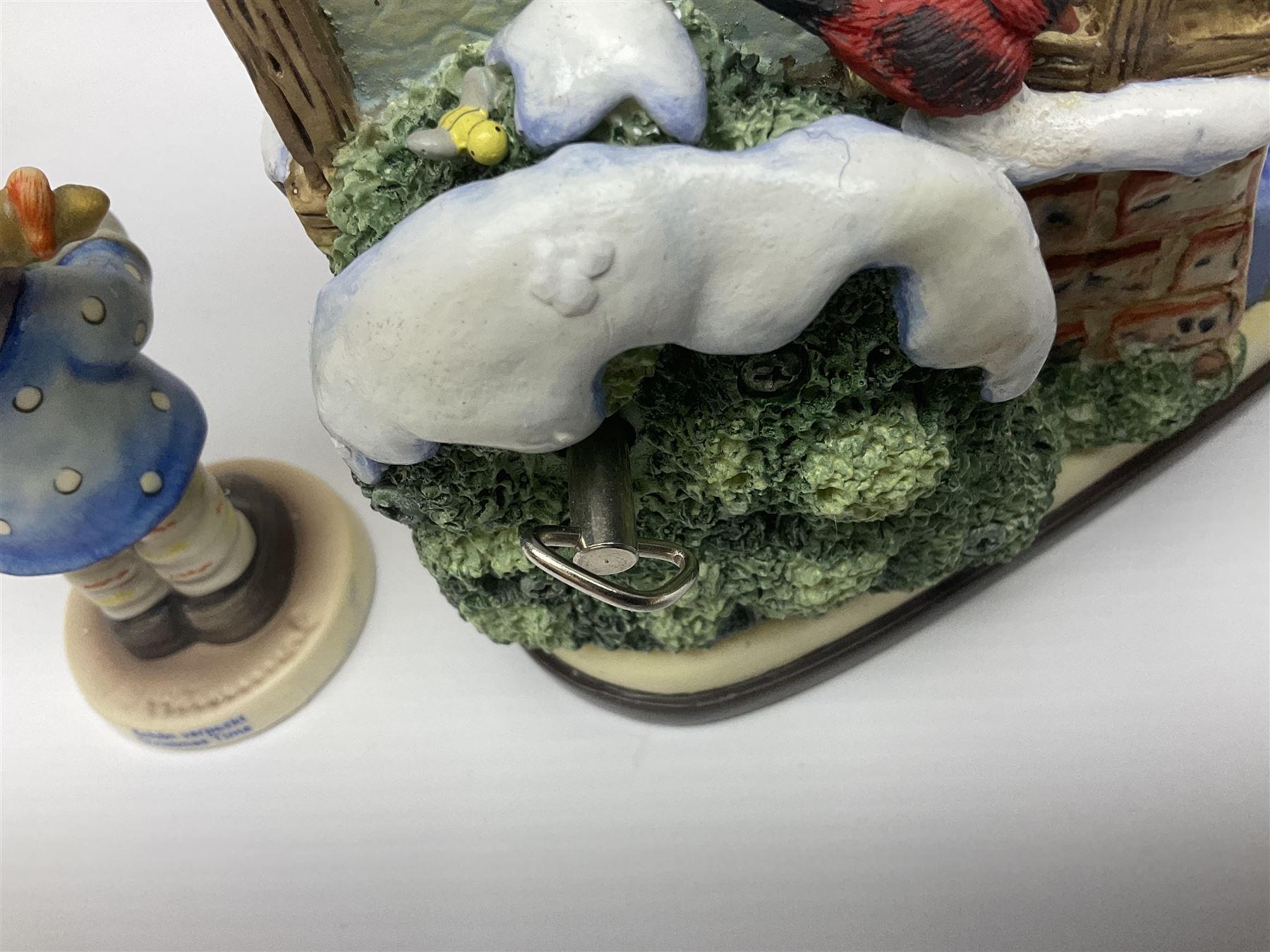 Eight Christmas Hummel figures by Goebel, to include Wintertime Chapel candle holder, Winter Fun, Christmas Morning, Christmas Time and Gingerbread Lane, tallest H21cm