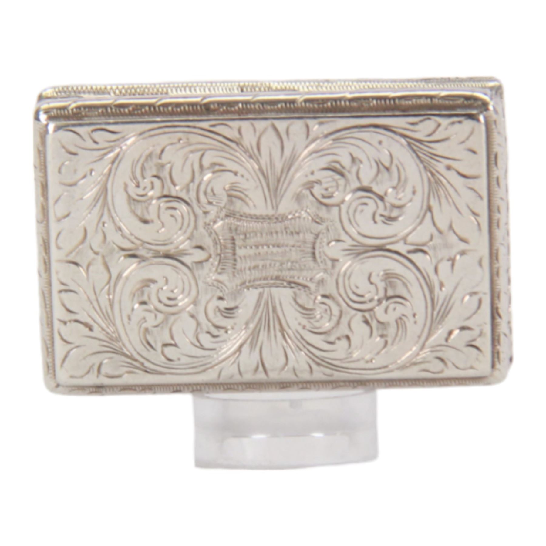 Victorian silver castle-top vinaigrette, of rectangular form, the hinged cover relief embossed with Windsor Castle, opening to reveal a foliate pierced grille, hallmarked Gervase Wheeler, Birmingham 1839, W4cm