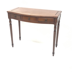  Chinese rosewood serpentine front side table, three drawers, turned tapering fluted supports, W92cm, H76cm, D46cm    