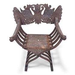 Anglo-Indian bone inlaid hardwood Savonarola chair, the pierced back finely carved with opposing peacocks amongst scrolling foliage, the seat, arms, and X-frame supports. This item has been registered for sale under section 10 of the APHA Ivory Act Reference QWLLGKZM