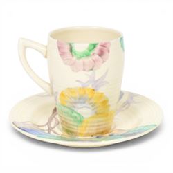 Clarice Cliff Viscaria patter coffee cup and saucer, hand painted with a stylised trees, together with Rhodanthe plate, with Bizarre and printed marks to base, plate D21cm