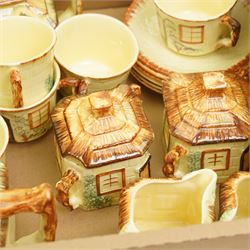 Keele St. Pottery cottage tea set comprising seven cups, six saucers, six plates, large and small teapots, butter dish, two milk jugs and two sugar bowls and covers