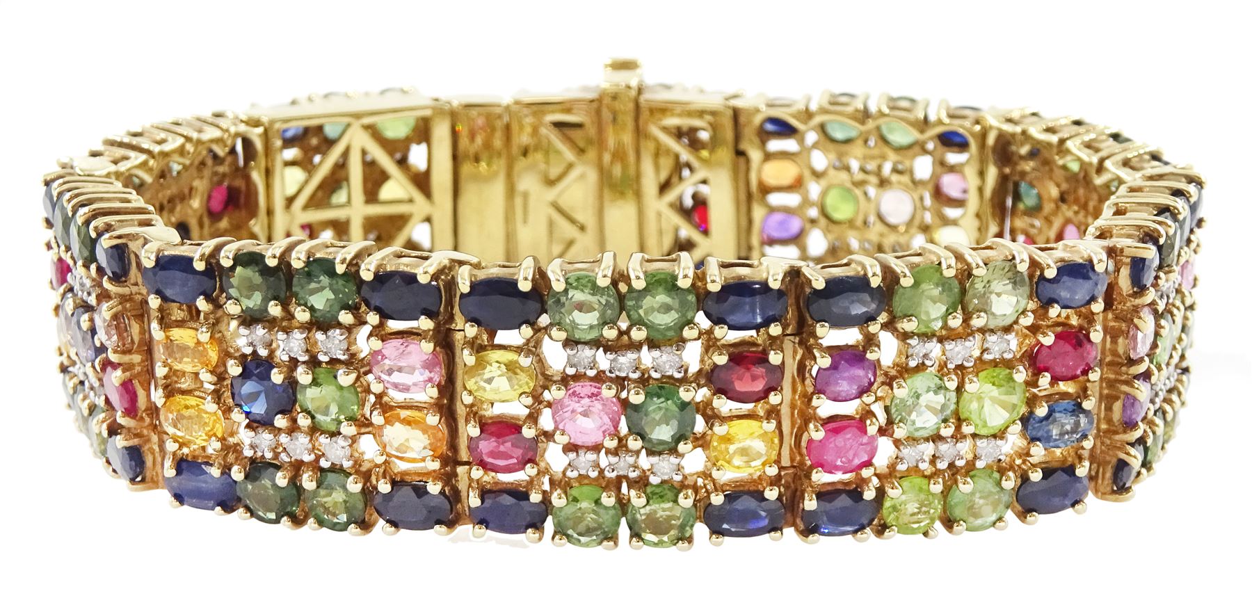 9ct gold sapphire, ruby and diamond bracelet, vari-cut blue fancy coloured sapphires, oval cut rubies and round brilliant cut diamonds, Birmingham 2006