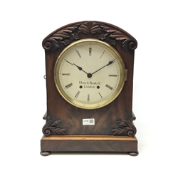  19th century carved mahogany bracket clock, circular enamel dial inscribed Hunt & Roskell London, twin train brass movement stamped M. Winterhalder in Friedenweiler, striking the hours on a bell, on bun feet, H43cm W32cm, D16cm  