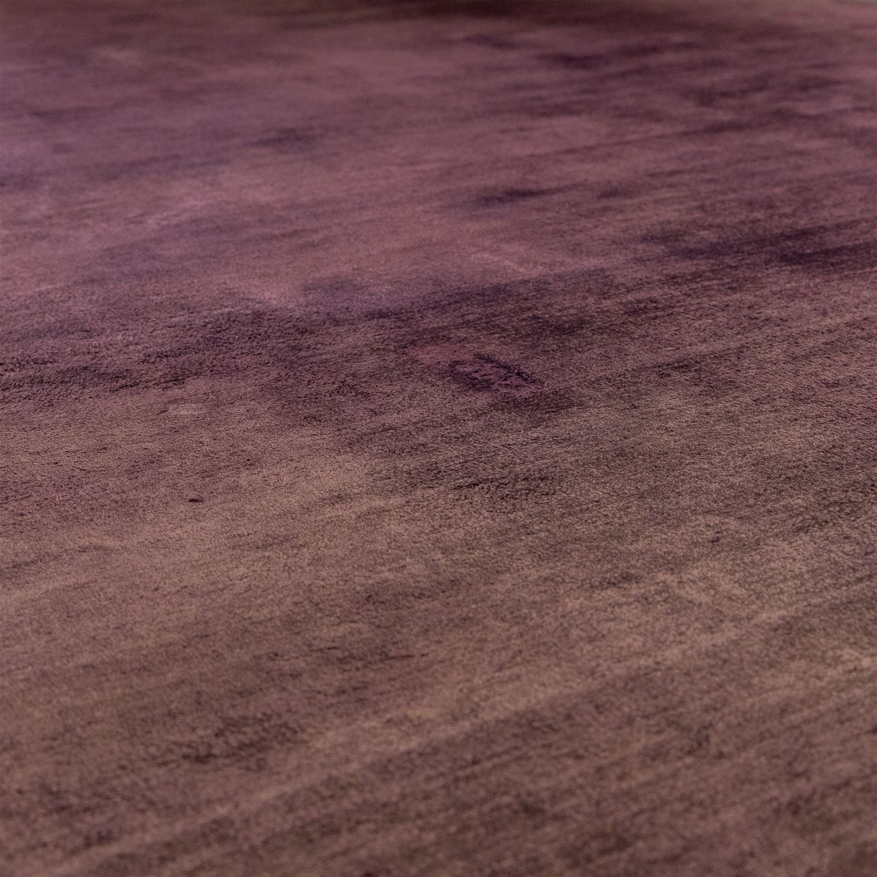 Jacaranda - 'Satara' damson coloured low pile hand woven rug, tencel yarn with cotton backing 