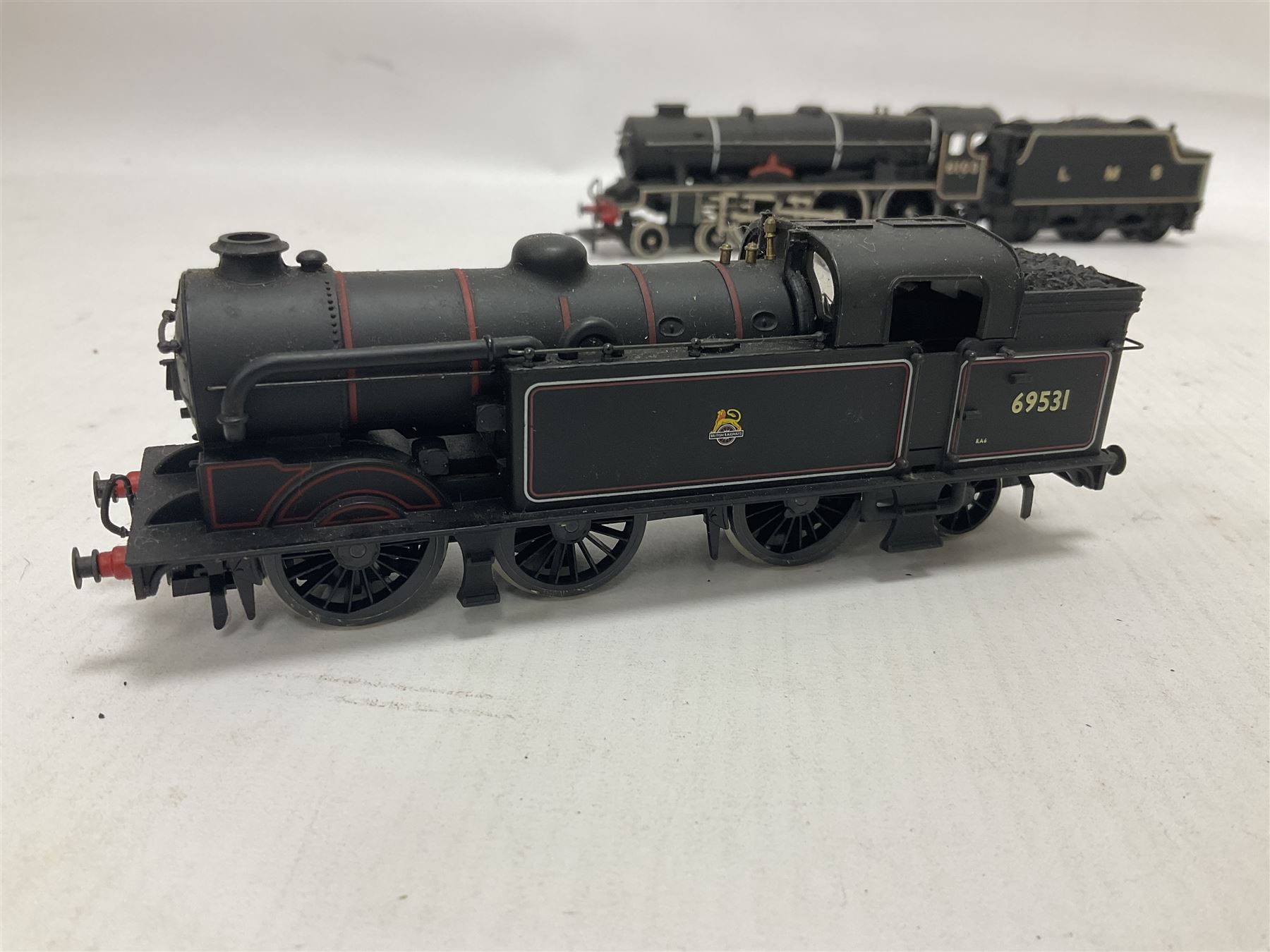 Airfix ‘00’ gauge - seven locomotives comprising Class 7P (Royal Scot) ‘Royal Scots Fusilier’ 4-6-0 no.6103 in LMS black with Mainline tender; two Class N2 0-6-2T no.69531 in BR black; Class 1282 2-4-0 no.20185 in LMS black; Class 61XX 2-6-2T no.6167 in BR black; Class 14XX 0-4-2T no.1466 in GWR green, all unboxed; Class 4F 0-6-0 no.4454 in LMS black, in original box (7)
