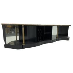 Italian ebonised and gilt serpentine corner console bookcase cabinet, shaped pink marble top over assorted shelves and dividers with fluted pilasters and mirror backs, on skirted base 