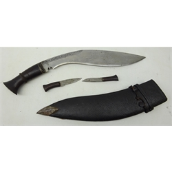  Kukri Knife, 34cm curved single edge blade with shaped wooden handle, in steel tipped leather sheath with two smaller knives, L46cm  