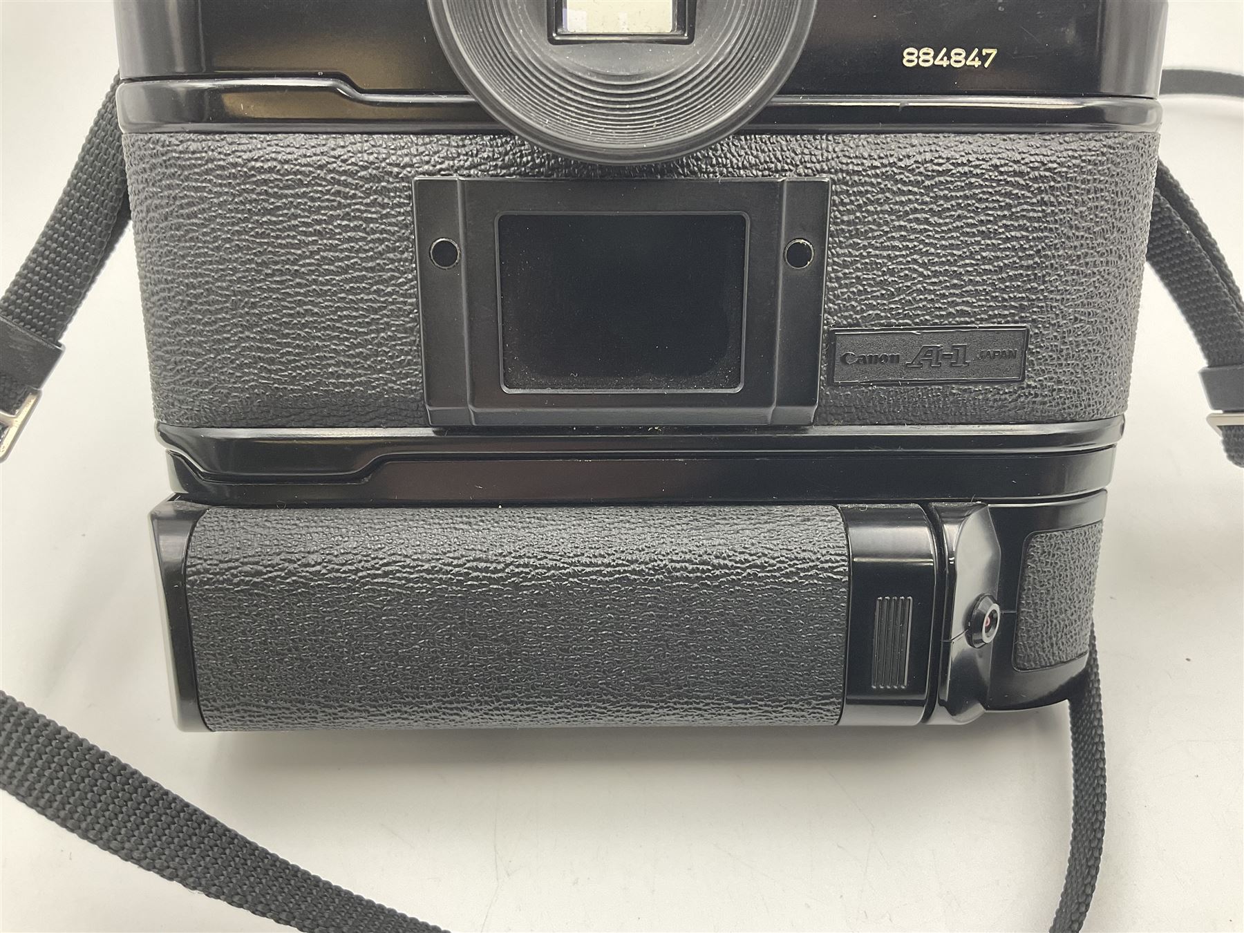 Canon A1 camera body, serial no 884847 with 'Canon FD 55mm 1;1.2 s.s.c' lens serial no 115005