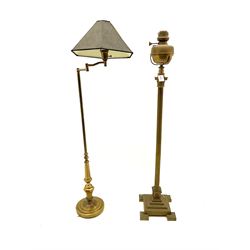 Early 19th century brass Corinthian column floor standing oil lamp and a brass adjustable standard lamp (2)