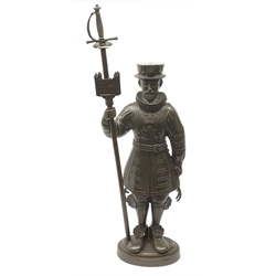 A cast iron figural companion set modelled as a Beefeater, H83cm. 