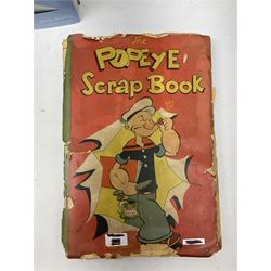 Ten books of predominantly military aircraft interest including Aircraft Anatomy World War Two, Hurricane Messerschmitt, The Avro Lancaster, The Luftwaffe Album, Encyclopaedia of Aircraft of WWII etc; together with a scrap album of WW2 newspaper cuttings