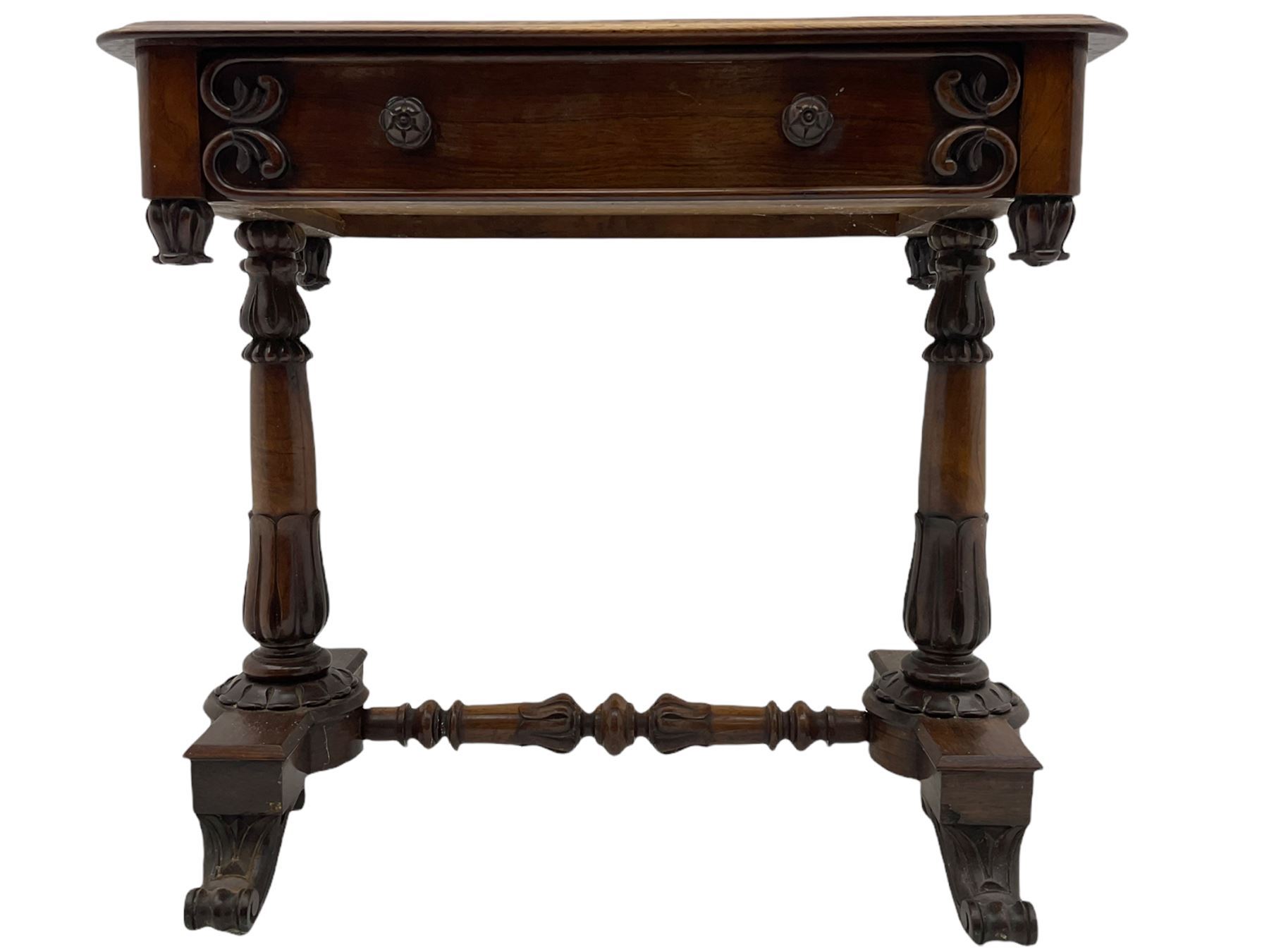 Victorian rosewood stretcher table, moulded rectangular top with rounded corners over single drawer, turned and carved twin pillar supports on platforms joined by turned stretcher, scroll carved feet