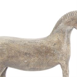 Carved Folk Art wooden horse, with glass eyes, H33cm