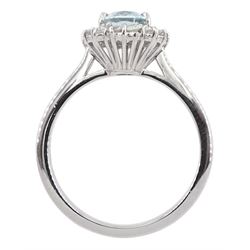 18ct white gold oval aquamarine and round brilliant cut diamond cluster ring, hallmarked, aquamarine approx 1.00 carat, total diamond weight approx 0.30 carat