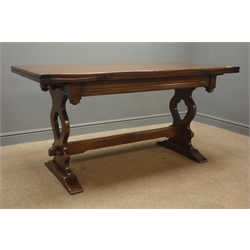  Bevan and Funnell Ltd oak extending dining table, pierced solid end supports joined by single stretcher on sledge feet, (229cm x 77cm, H78cm, maximum measurements) and six chairs (4+2) shaped cresting rail, turned supports  