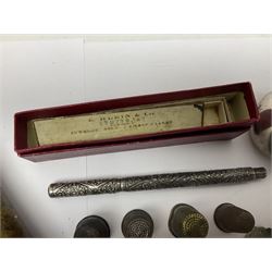 14ct gold coral stick pin, together with six pre-1947 silver halfcrown coins, silver napkin ring, silver mounted pen and other collectables