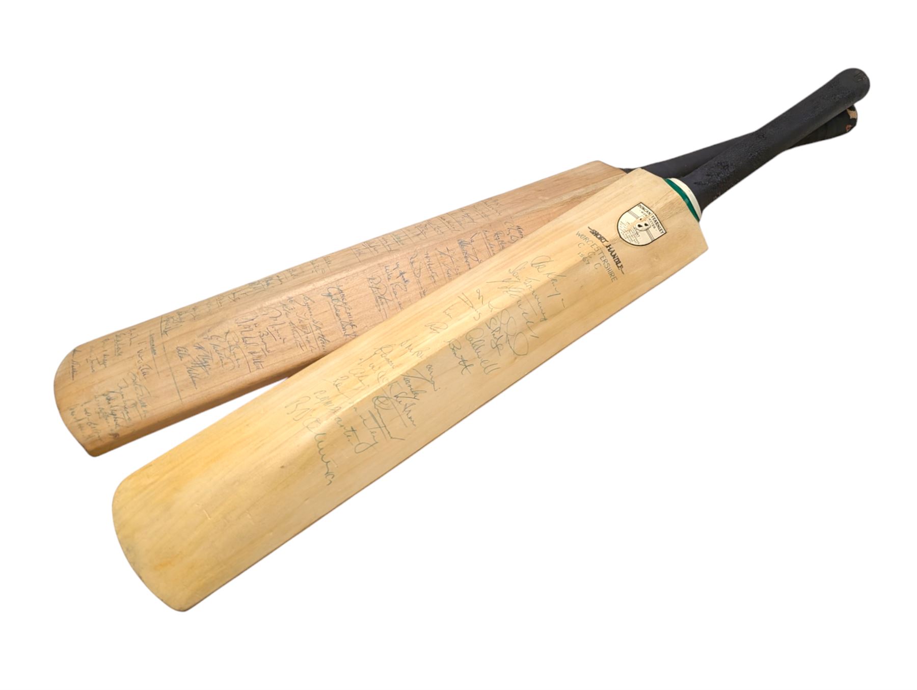 Two signed cricket bats, with signatures including Colin Cowdrey