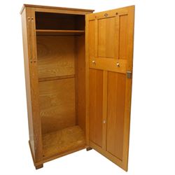 Arts & Crafts design limed oak bedroom suite; comprising dressing table, single wardrobe and chest, with carved scrolling motifs.

Wardrobe (H 181cm, D 47cm, W 79cm)
Chest (H 74cm, D 46cm, W 73cm)
Dressing table (H 136cm, D 47cm, W 74cm)