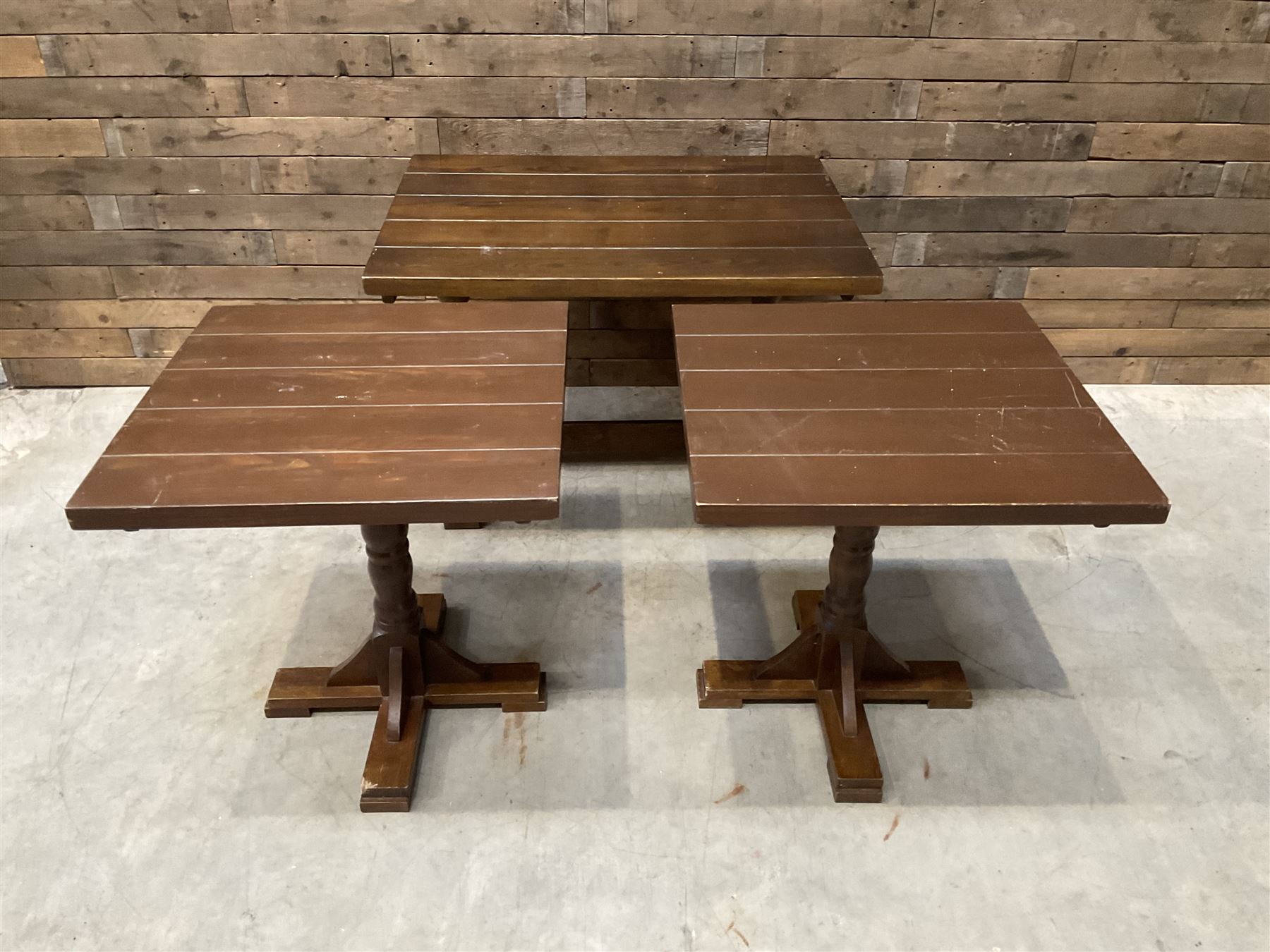 Single oak rectangular table on turned supports joined by a single stretcher (W110cm, D80cm, H75cm) and two similar square pedestal tables (W70cm, D70cm, H76cm) (3)