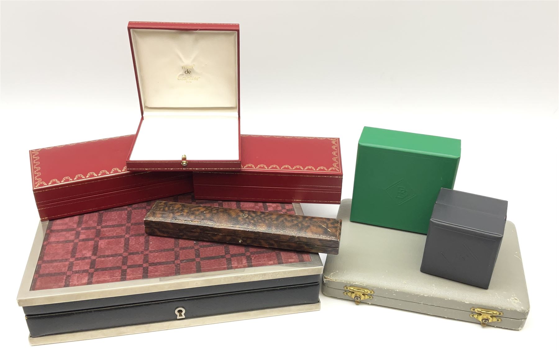 Collection of jewellery boxes including a vintage Boodle & Dunthorne bracelet box, two modern Boodles boxes, two Cartier Santos 701 sunglasses cases, one other Cartier box, Harrods cufflink/ring box and a Penlington & Batty necklace box (8)