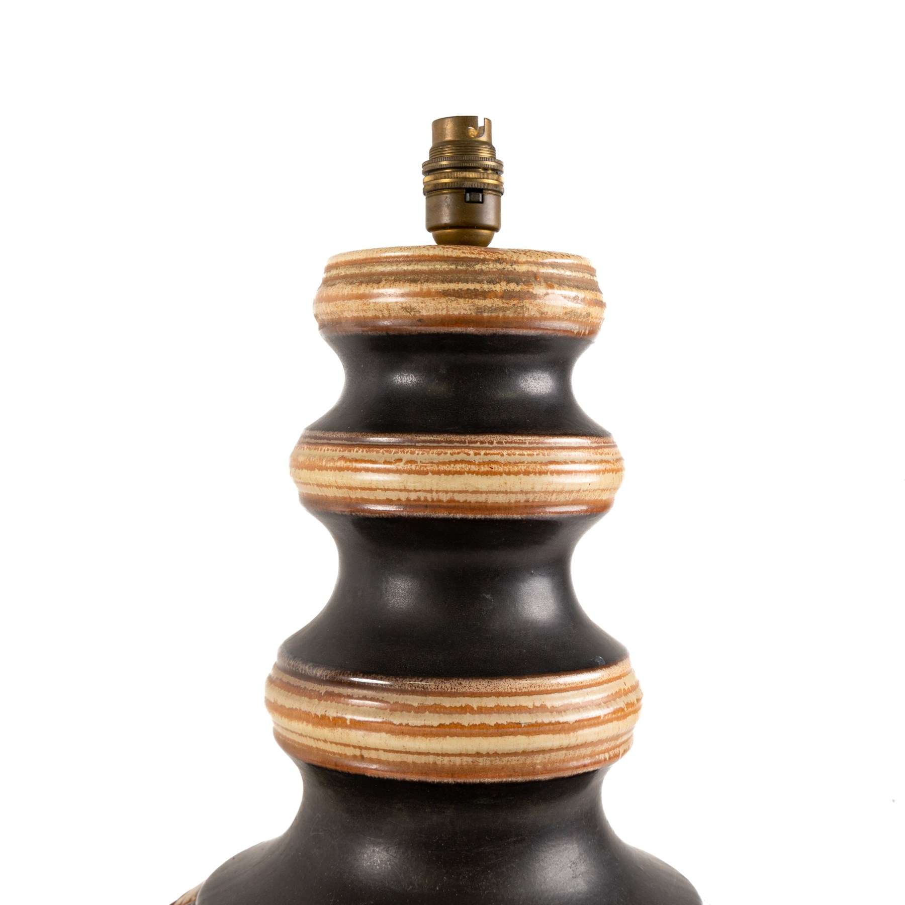 West German Pottery - two mid 20th century ceramic lamp bases, brown glaze with petal style decoration and pierced detail, together with another similar with volcanic glaze, largest H52cm