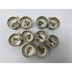 Set of four late 19th/early 20th century Meissen double salts, together with another matched example, each with loop handles, decorated with birds and insects and heightened with gilt, with blue crossed sword marks beneath, H5cm L9cm