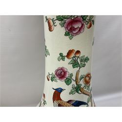 Large ceramic Jardiniere on stand, decorated with an oriental pheasant perched upon branches blossoming with peonies and foliage on white ground, overall H99cm