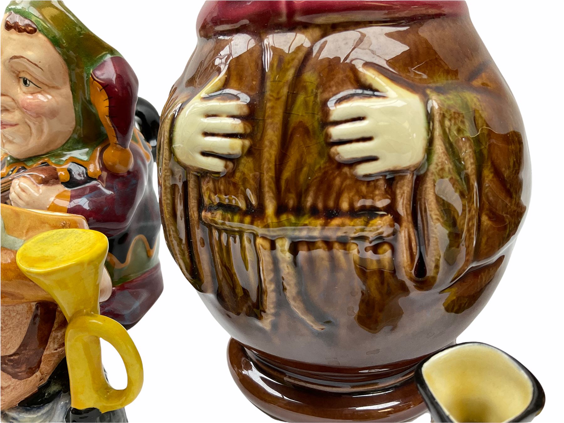 Character and toby jugs, including a staffordshire pottery style toby jug, Olfaire toby jug, Beswick character jug depicting Scrooge, Royal Doulton Veteral Motorist etc, together with Royal Doulton Sweet Dreams figure. 