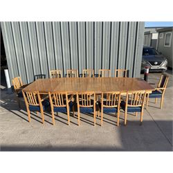 Light oak bespoke boardroom table, concave form, four sectional top on square discreet legs (12' x 5'), with twelve armchairs including 'Chairmans' chair