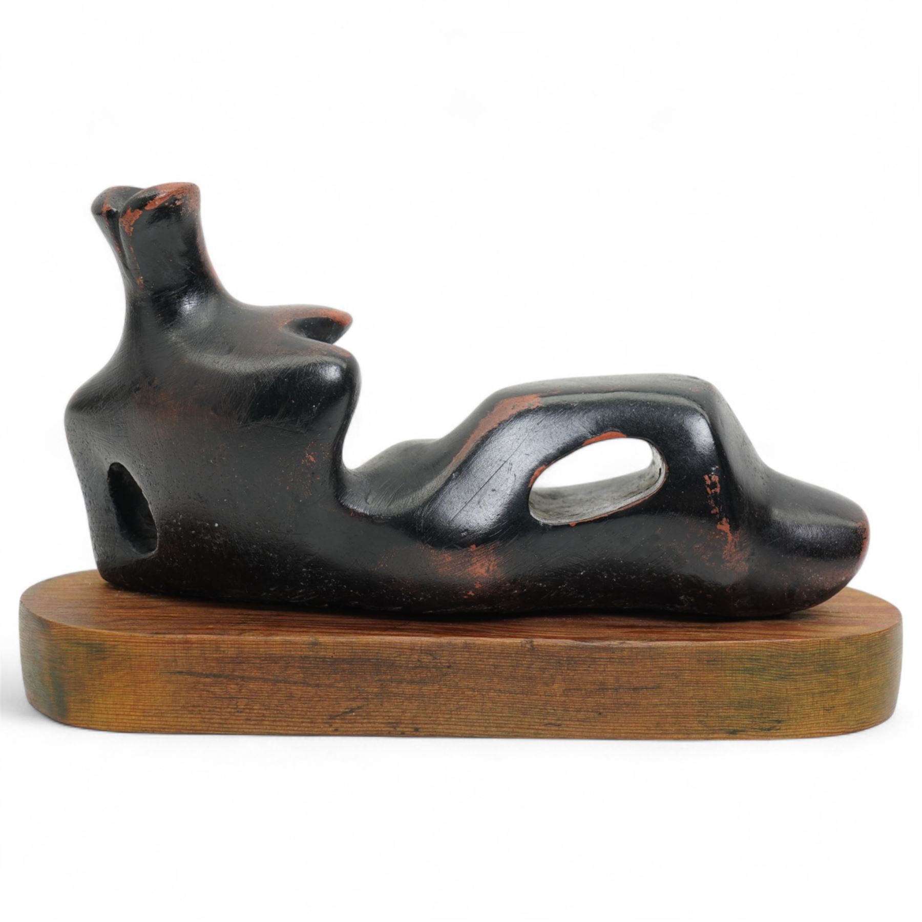 After Henry Moore (British 1898-1986): 'Reclining Figure', terracotta maquette sculpture, base marked with affixed catalogue label inscribed ‘Reclining Figure: 1939 Archive 0074229', W20cm H12cm
Notes: the original is on display at the Tate Britain